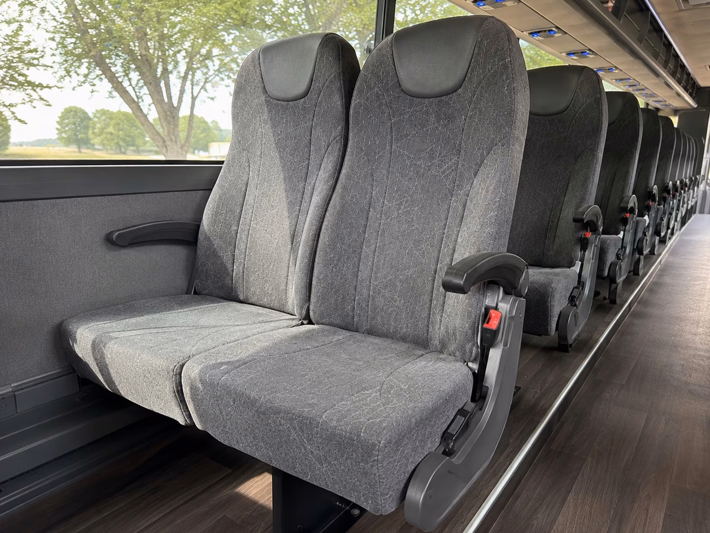 conroe charter bus rentals to cynthia woods mitchell pavilion